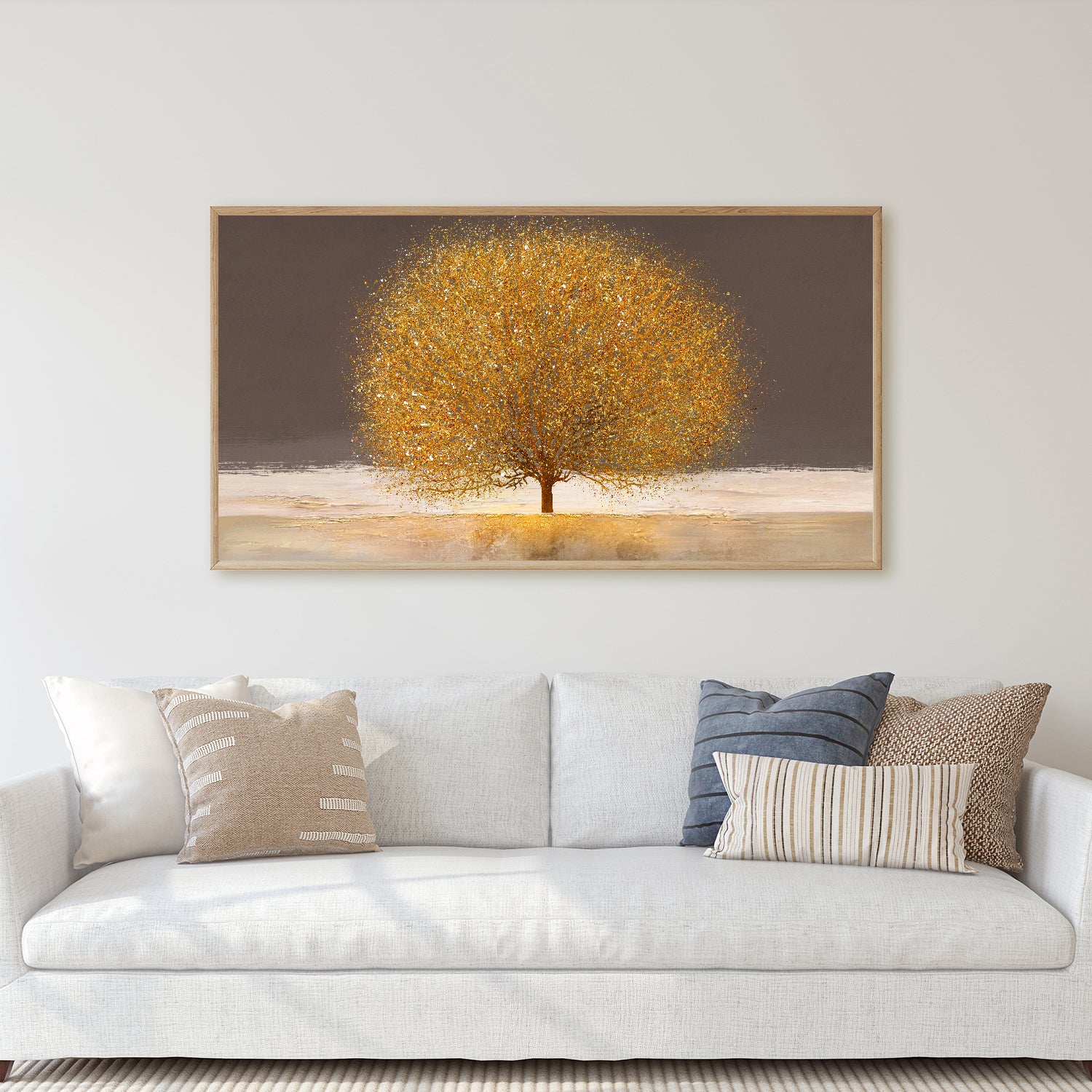A solitary tree with shimmering gold leaves.