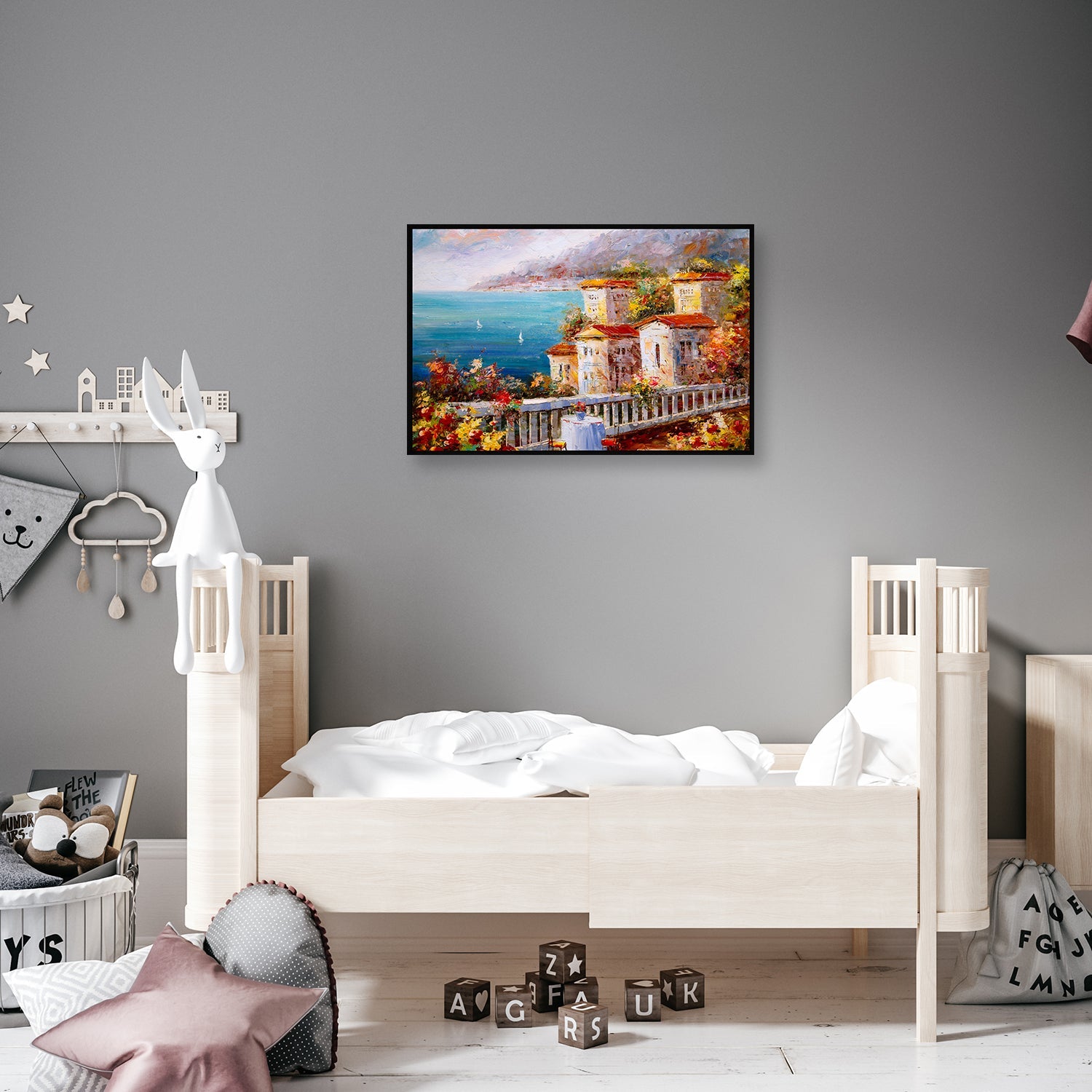 Colorful painting of a Greek harbor with  houses and a table.